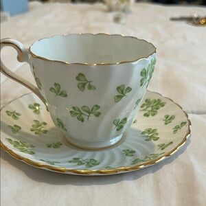Elegant Green and Gold Tea Cup and Saucer Set